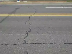 Types of Asphalt Damages 3 Longitudinal Asphalt Cracking